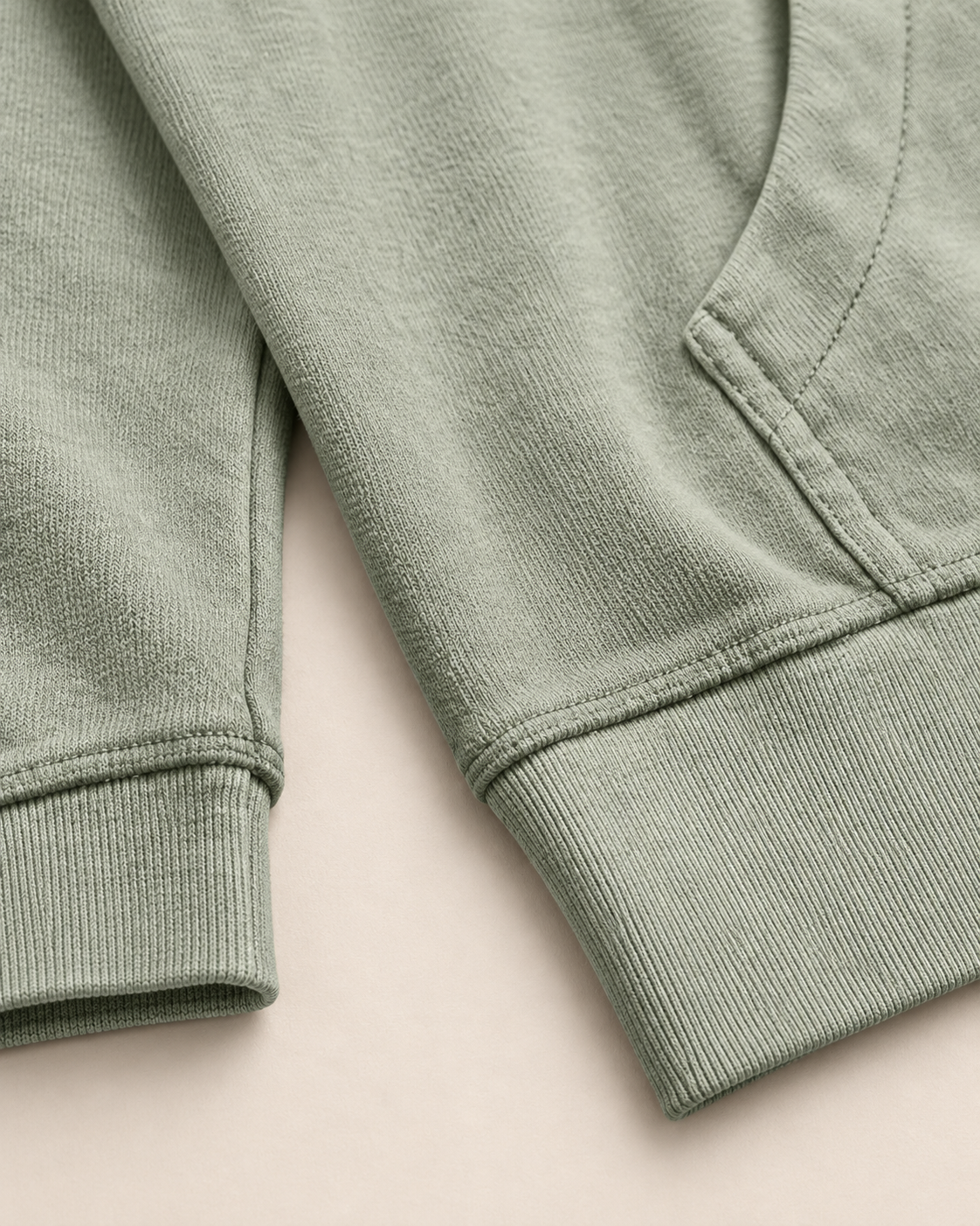 Nature heart logo hoodie, sage, cuff and pocket detail — Nature Wear Brand