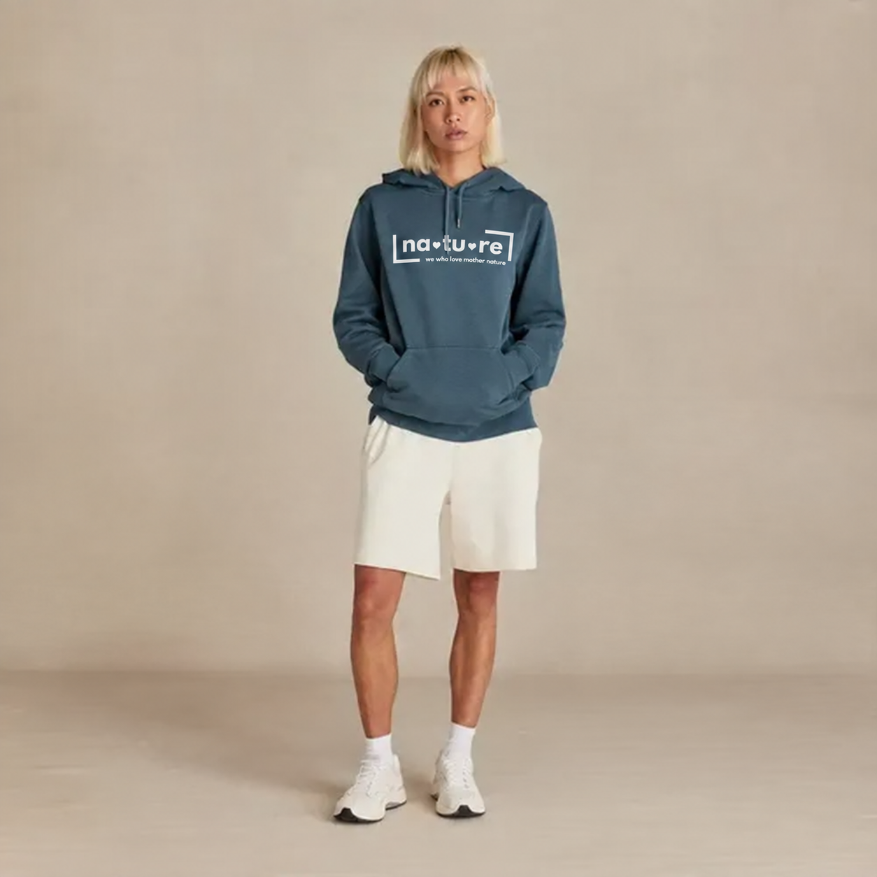 Nature heart logo hoodie, navy, front on model — Nature Wear Brand